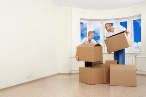Professional movers handling furniture