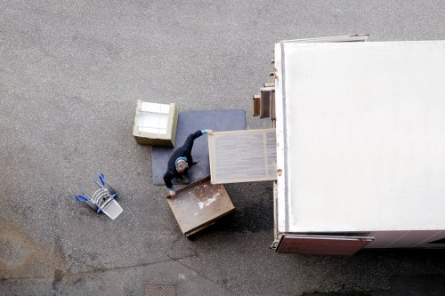 Professional movers handling office equipment in Fulham
